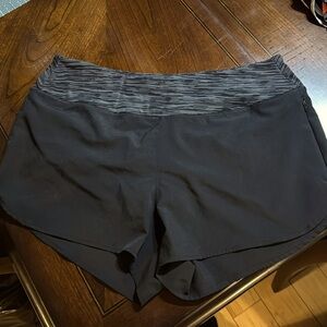 Black workout shorts with zip pocket in large